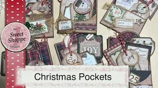 Christmas pockets filled with paper ephemera. Love the brads and cheese cloth to give it a pop