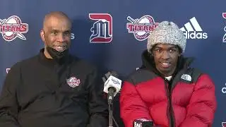 Antoine Davis celebrates breaking Detroit Mercy's all-time scoring record, dad Mike Davis coaching