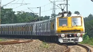 3 Different model EMU local trains passing a huge curvy rail track