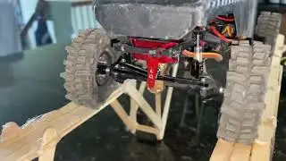 Axial deadbolt mini crawler on popsicle stick bridge for home mini crawler course
