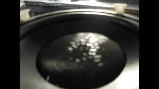 frequency pulsar test with water in speaker, mystery blue glow at edge of water