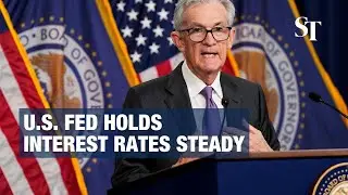 US Fed holds interest rates steady, but signals cuts ahead