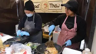 Eating Pad Thai Noodles on the Road. London Street Food