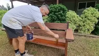 Re coating outdoor furniture with intergrain natures timber oil. bench, picnic table.