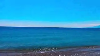 The Vast Ocean Under a Clear Summer Sky