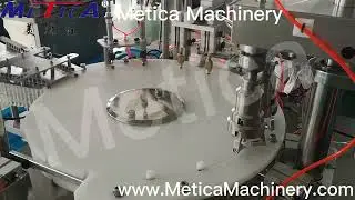 Semi automatic syringe capping machine with cap feeder
