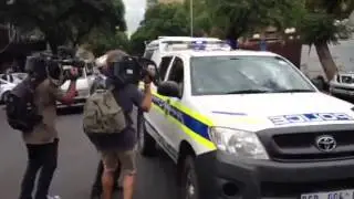 Oscar Pistorius leaving court, day 2 of bail hearing, Feb 2