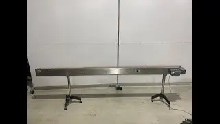Stainless steel conveyor 128in long with 3.25in wide belt