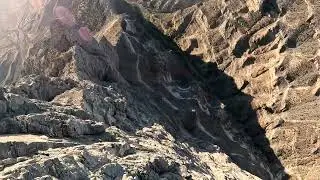 Leap into Twilight: A Flight from Norchi North Peak. #ExtremeSports #Flying #Wingsuit