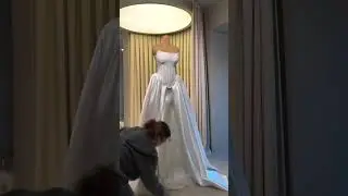 To order this white dress DM A refined bridal gown featuring a delicately embellished fitted