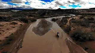 Dry wash flood Utahraptor State Park by Moab