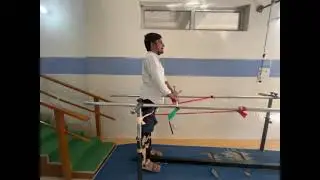 Spinal cord injury with paraparesis. Trunk control and weight bearing exercise with Theraband.