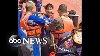 Trapped crew members rescued from capsized cargo ship l ABC News