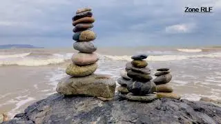 Rocks Balancing On The Seashore