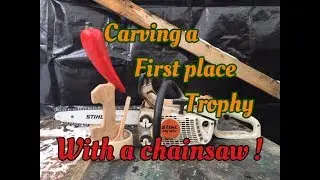 Carving a first place trophy.