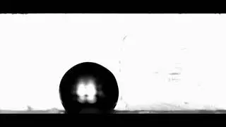 Liquid water droplet removal in shearing gas flow by acoustic pressure waves