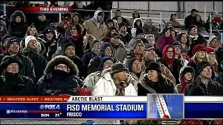 High school football fans brave cold temps