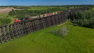 CN 8304 leads L 51551 30 on the Sangudo Sub - Huge Trestles and Wooden Elevators