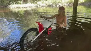 Dirtbike ends up bars deep in a creek (sunk)