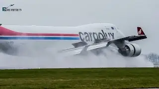 WATERSPRAY Landing & takeoff action at Amsterdam Schiphol Airport Plane Spotting B747/B777/A350/A330