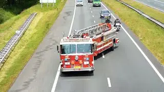 Tiller fire truck drifting on dutch highway with lights and siren