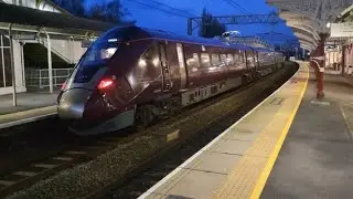 Class 810 arrives and depart Kettering train station 