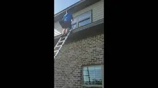Helpful Housekeeping cleaning windows. window cleaning service.  outside windows. 2nd story