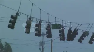 Traffic lights swing in hurricane winds. Stock Footage