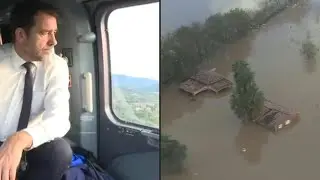 French Interior Minister tours flood affected areas by helicopter | AFP