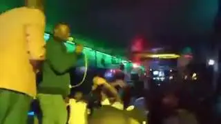 CROWD JEERING AND BOOING A MUSICIAN SINGING ASONG PRAISING UHURU IN ACLUB IN THIKA