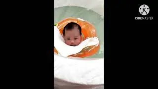 shihan 1st time swimming w/ neck float she just turn 1month old jan 13,2021