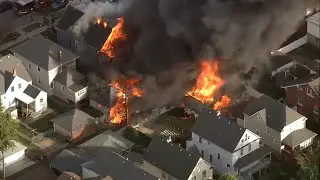 Massive fire destroys house, damages 2 more in Whiting, Indiana