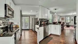 Charming cottage in Hip East Nashville offers an open floor plan concept.