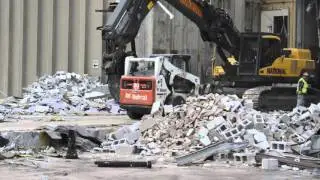 Bobcat S650 Skid Steer Pushing Debris