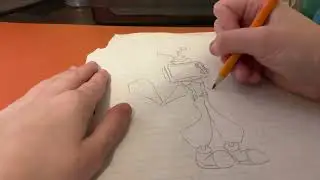 Drawing Mr.Puzzles on paper for first time