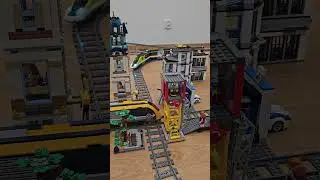 LEGO train 60337 stops to let 60197 pass