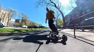 AS IF riding an electric snowboard down Ocean Parkway Brooklyn in sunny April.