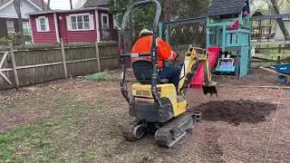 Backyard basketball court made with unilock pavers