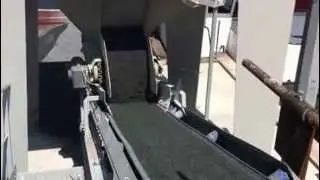 Measuring moisture on an asphalt conveyor with a Hydronix Hydro-Mix