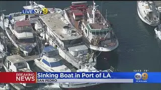 Firefighters Try To Keep Boat From Sinking In San Pedro