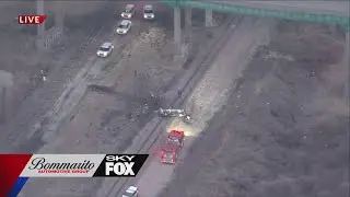 One ramp closed to Poplar Street Bridge, car falls off approach to bridge and lands on train tracks