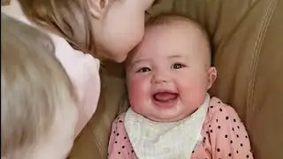 Baby Aubrey reacting to all the kisses and love from her siblings #6monthsold #siblinglove #cutness