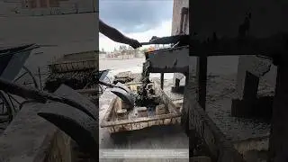 Workers operate vibrating molds to quickly produce standardized precast concrete components!
