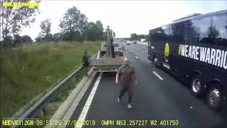Terrifying moment window frames topples in to path of lorry on  M6