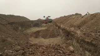 Far from the site ! Elite Earth Movers !