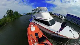 Towing a 62' Paul Mann On a Windy Day From Haul Out Well to a Slip to Finish Work on the Boat