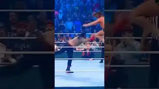 Roman Reigns mid-air spear to Riddle
