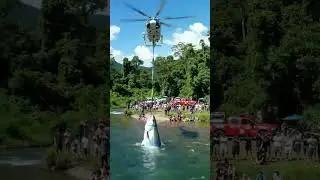 Helicopter Lifts a Giant Fish from the River &ndash; Stunning Drone View