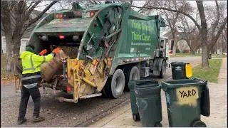 Waste Management Compost Truck With Thrower in Action Collecting Leaf Bags-Rear Loader Garbage Truck