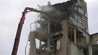 Hitachi 870 from Martens Democom demolishing feed plant in Mersch, Luxembourg